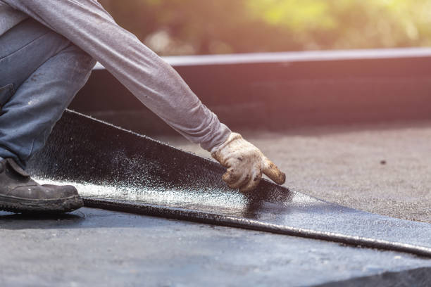 Professional Waterproofing technician working in Wheaton, MD